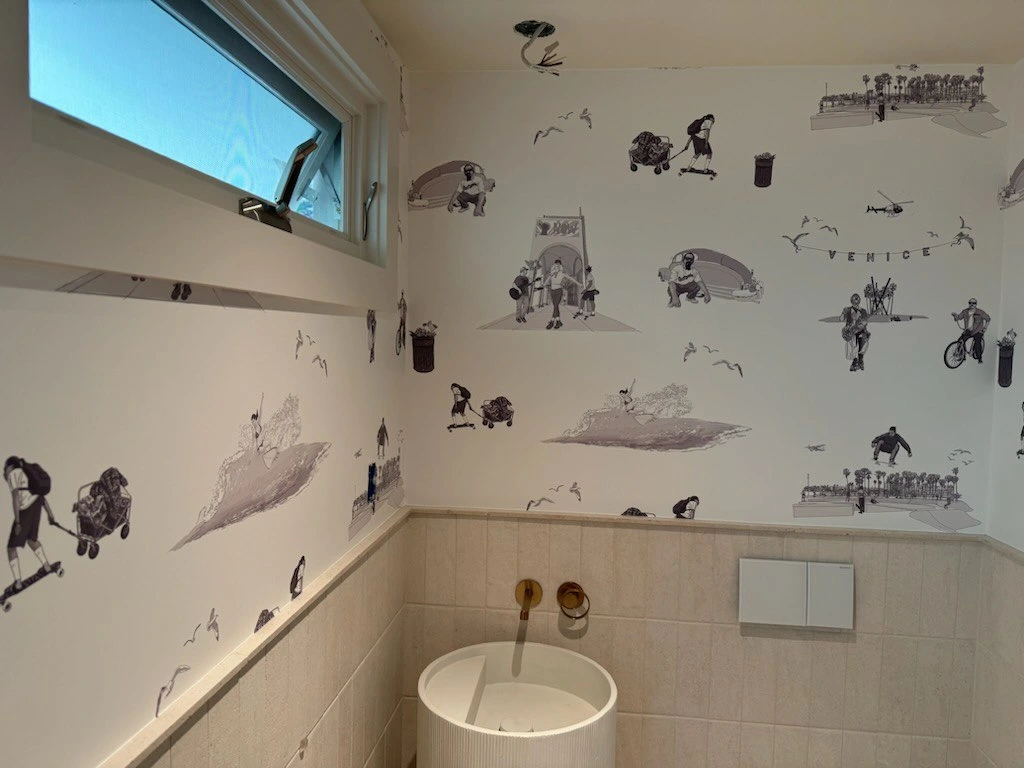 Wallpapered room with a patterned accent wall